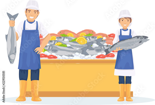 Two fishmonger sell fresh fish in the market