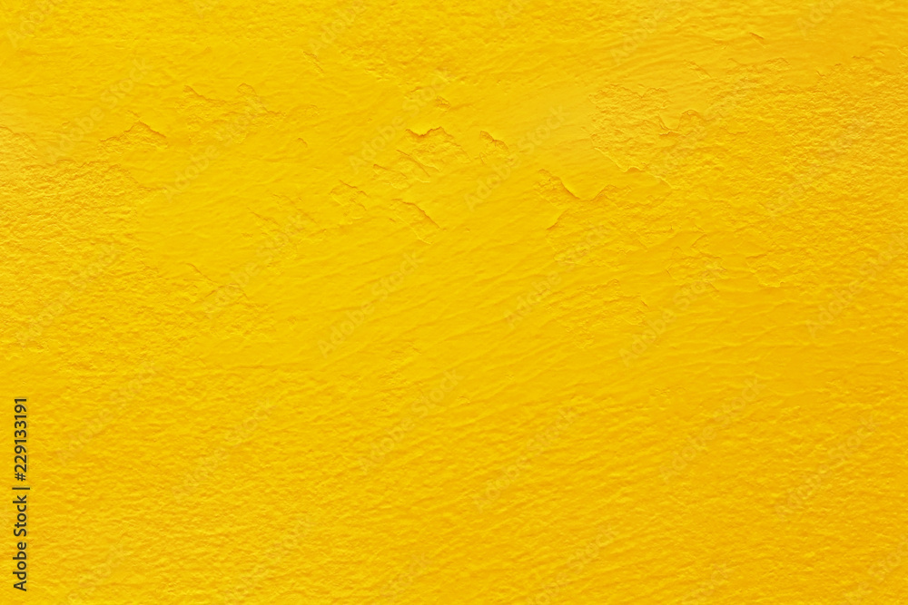 Yellow concrete cement wall texture for background and design art work
