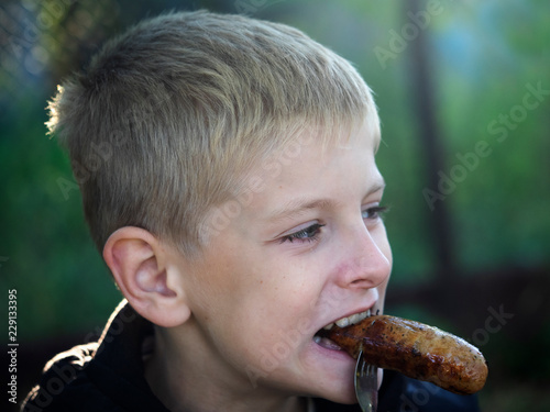 Caicasian boy eating