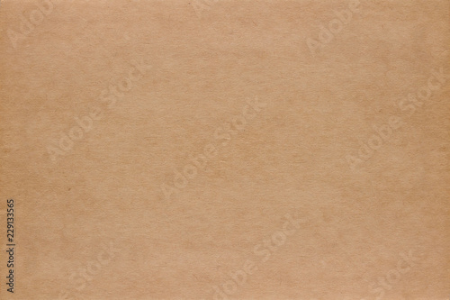 Old brown wrapping paper textured background.