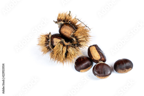some chestnuts on a white table