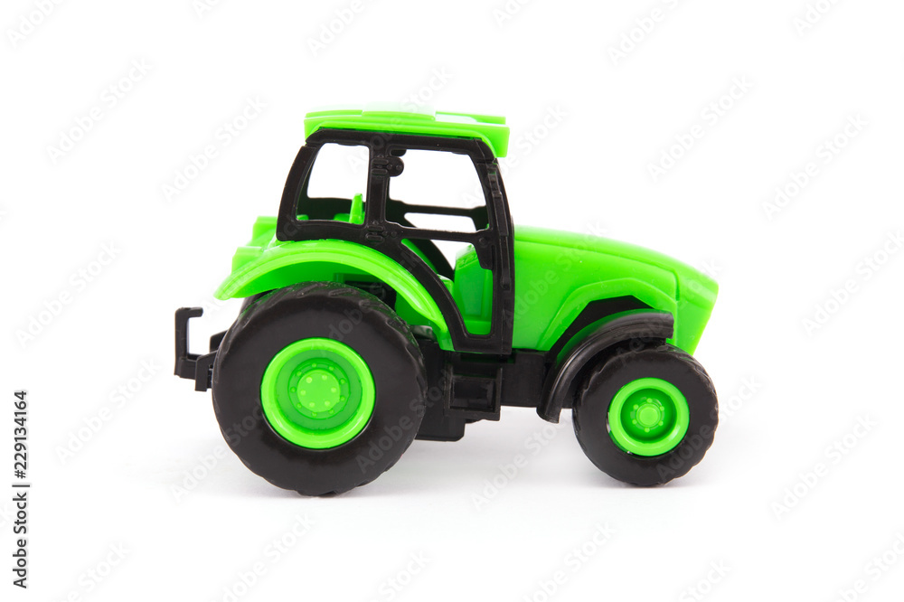 Toy tractor isolated on white Toy tractor isolated on white