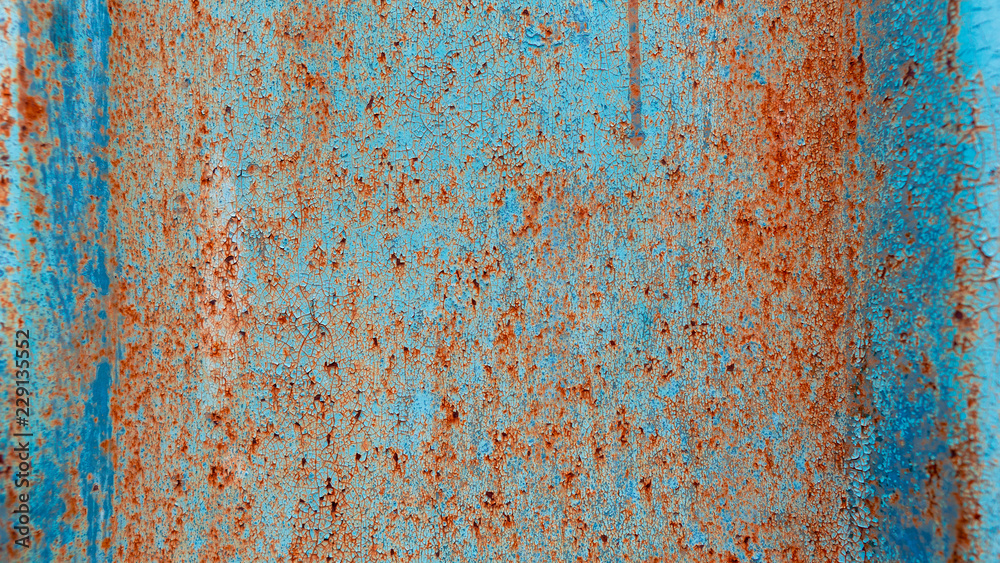 Rusty texture on a metal container that is on the street all year round.