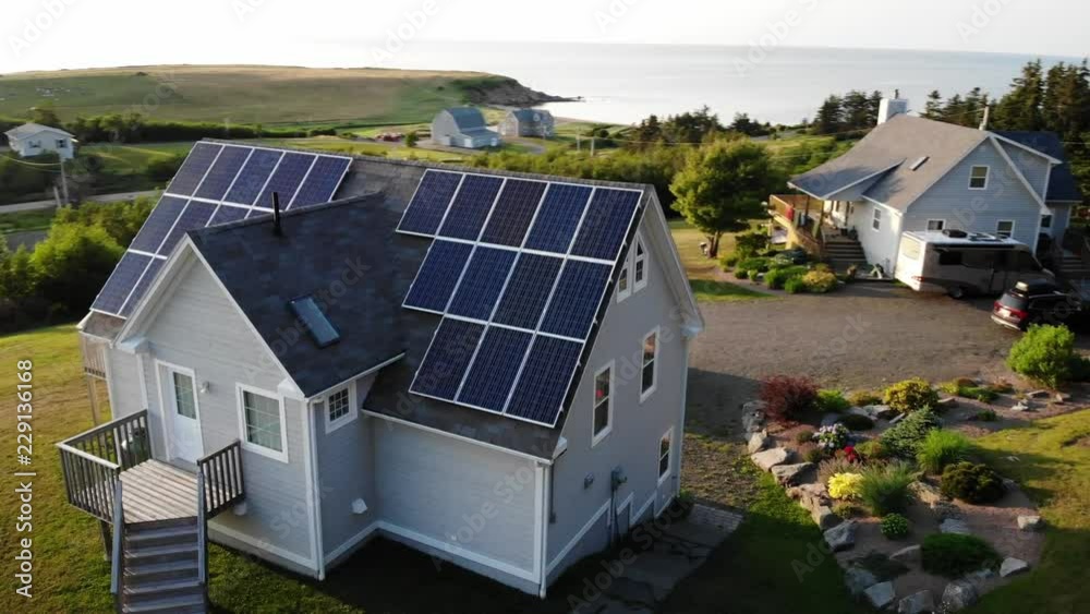 Aerial Shot Beautiful Coastal House With New Solar Panels On Top Of Roof