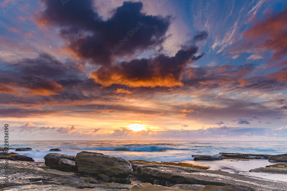 An Atmospheric Sunrise Seascape An Atmospheric Sunrise Seascape