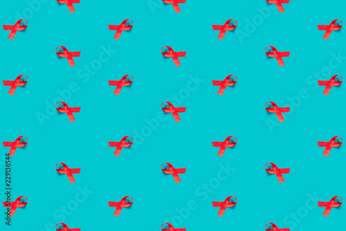Wallpaper Mural Red ribbon pattern on a blue background, flat lay. Top view. Torontodigital.ca