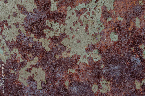 texture of rusty old metal with corrosion. Grunge style dirty iron background with exfoliating paint © alexkoral