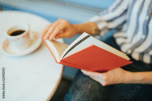 Bilde på lerret Closeup of a woman reading a book