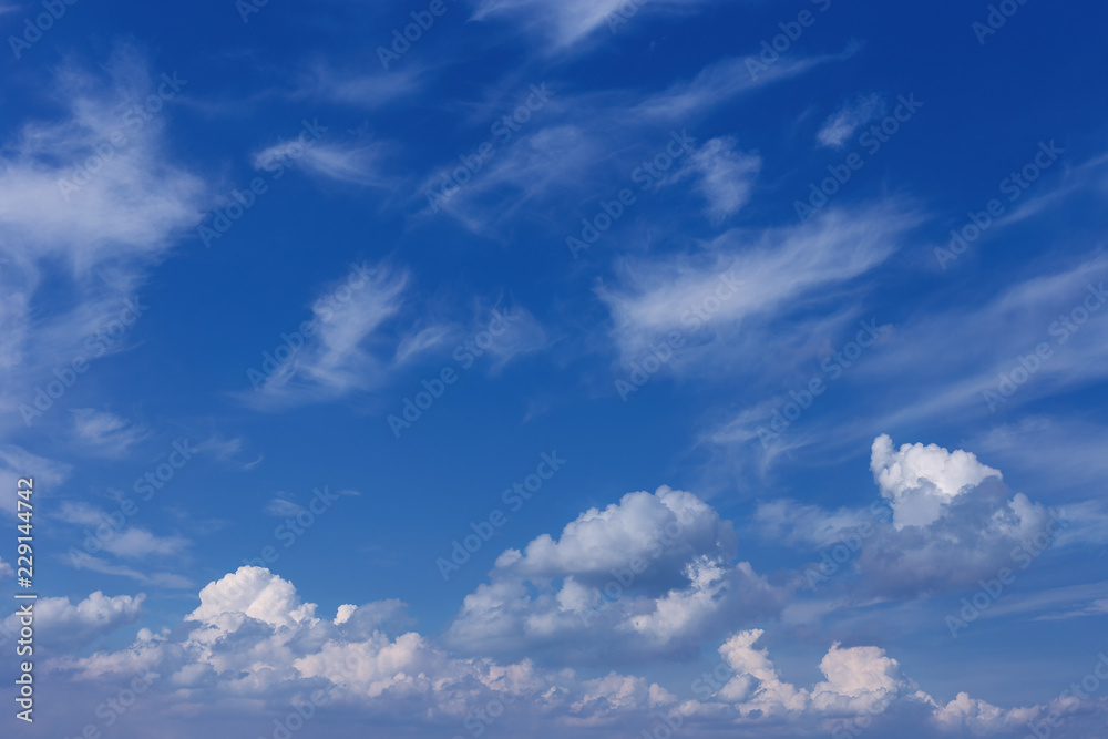 Beautiful blue sky with white clouds as a natural background. Beautiful blue sky with white clouds as a natural background.