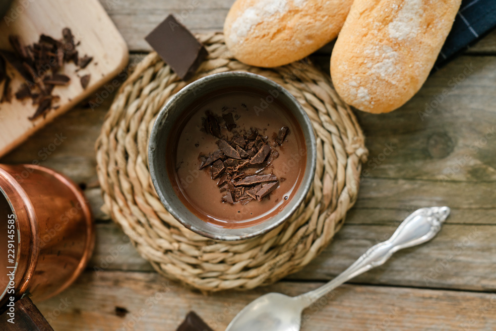 Top view of a hot chocolate cup with chocolate chunks topping Top view of a hot chocolate cup with chocolate chunks topping