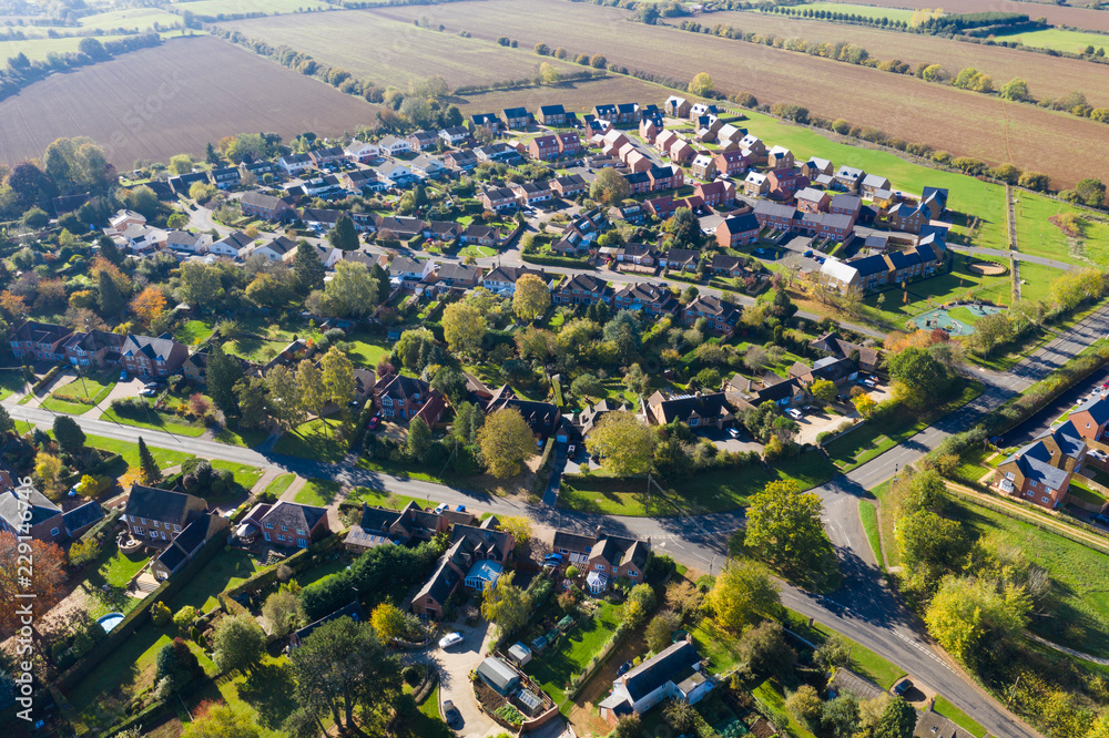 Aerial view of homes in a rural village setting in England