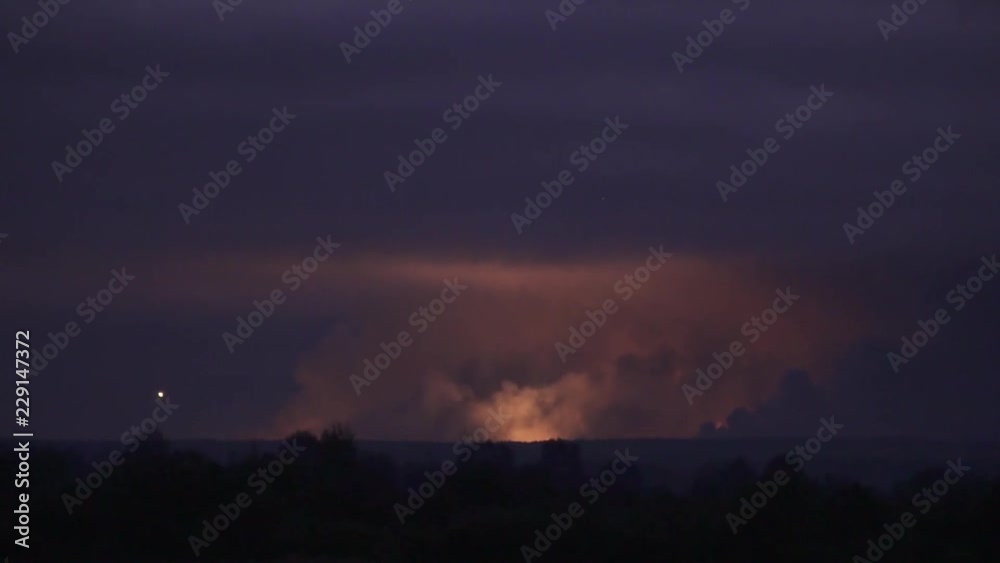 Projectiles and missiles flying out of the smoke and into the sky, aerial shot Projectiles and missiles flying out of the smoke and into the sky, aerial shot