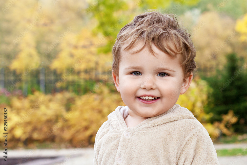 Portrait of cute little boy. Happy lovley child looking at camera Portrait of cute little boy. Happy lovley child looking at camera
