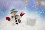 Snowman is standing in snowfall, Merry Christmas and happy New Year concept