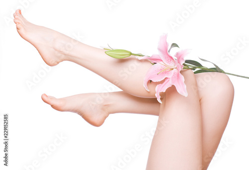 legs of beautiful girl with lilly four