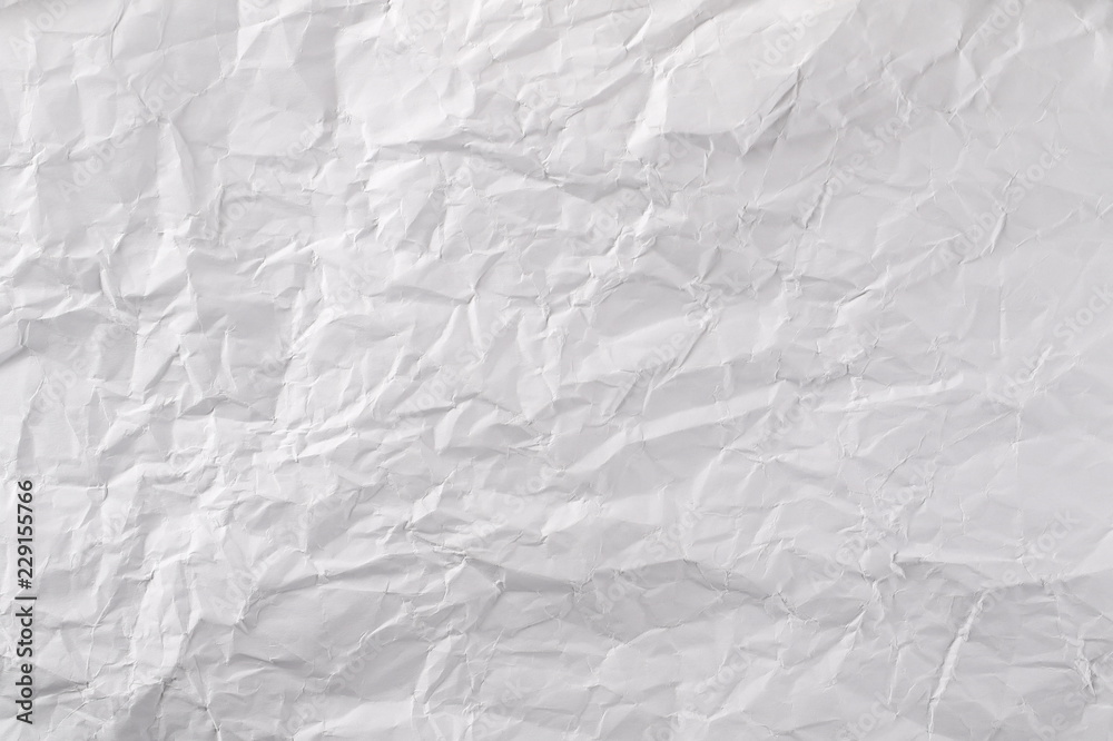Crumpled white paper background and texture Crumpled white paper background and texture