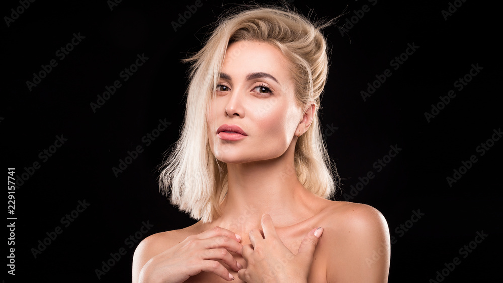 beautiful model with blond hair on black background. beautiful model with blond hair on black background.