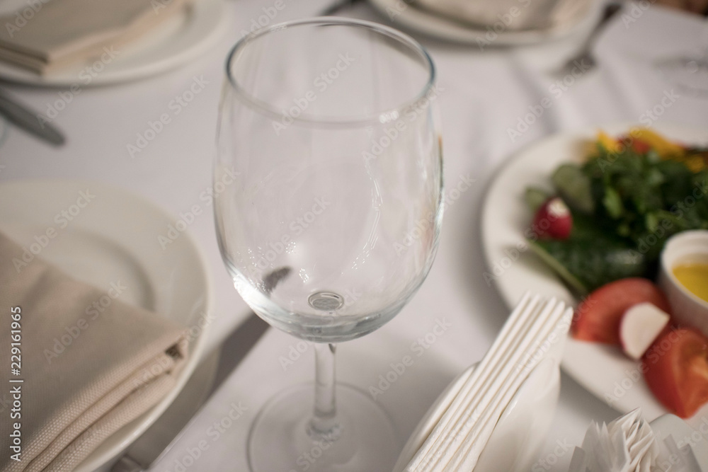 Empty glasses set in restaurant Empty glasses set in restaurant