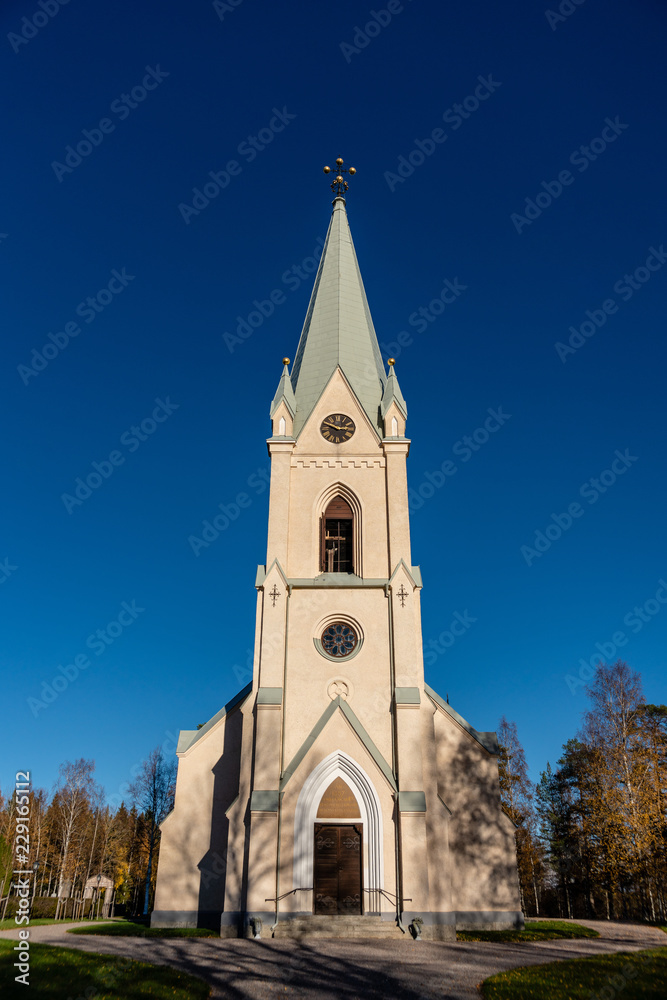 White Stone church in autumn sunshine