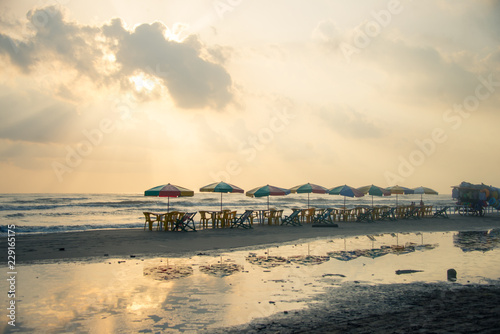 amanecer en la playa con sombrillas tecolutla veracruz photo