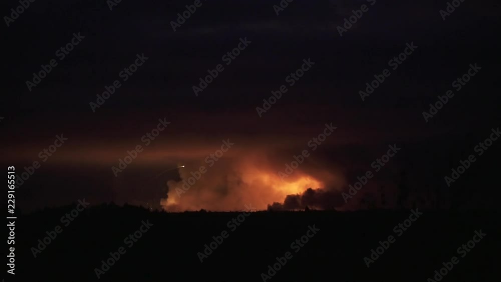 Sky and horizon covered in smoke from massive explosions, aerial shot Sky and horizon covered in smoke from massive explosions, aerial shot