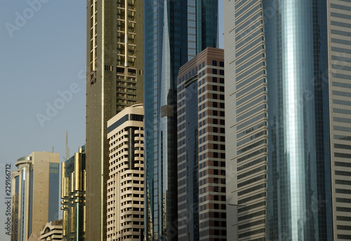 Modern skyscrapers, Sheikh zayed road, Dubai, United Arab Emirates. Dubai is the fastest growing city in the world. photo