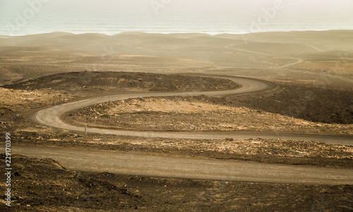 Dirt road leading to Cofete beach in Fuerteventura  Spain.