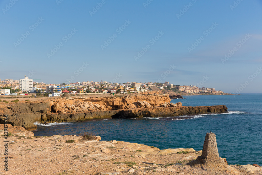 Rocky coast view north of Torrevieja Spain towards direction of La Mata 
