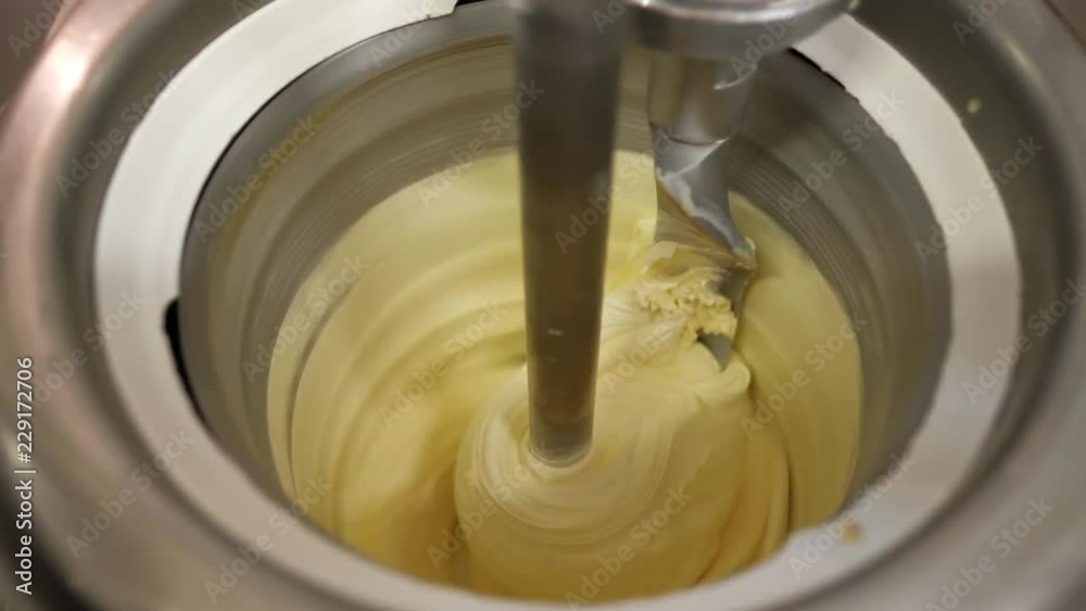 Ice cream preparation with different tools, ingredients, and machines Ice cream preparation with different tools, ingredients, and machines