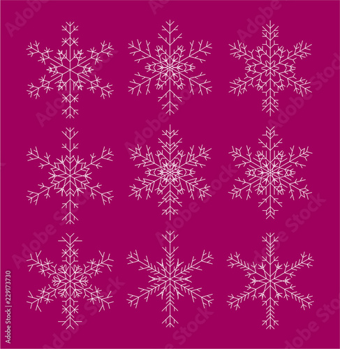 Snowflakes set on dark pink background