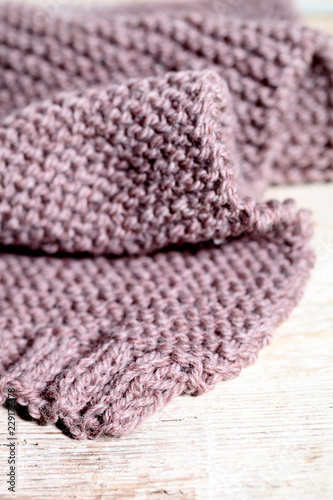 Knitted brown scarf.