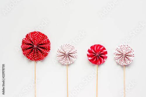 Red and white paper fan wit...