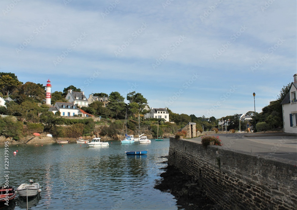 Doelan Harbour and its red lighthouse, Brittany, France