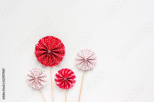 Red and white paper fan wit...