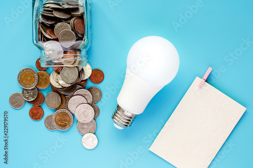 Coins in glass jar and outs...