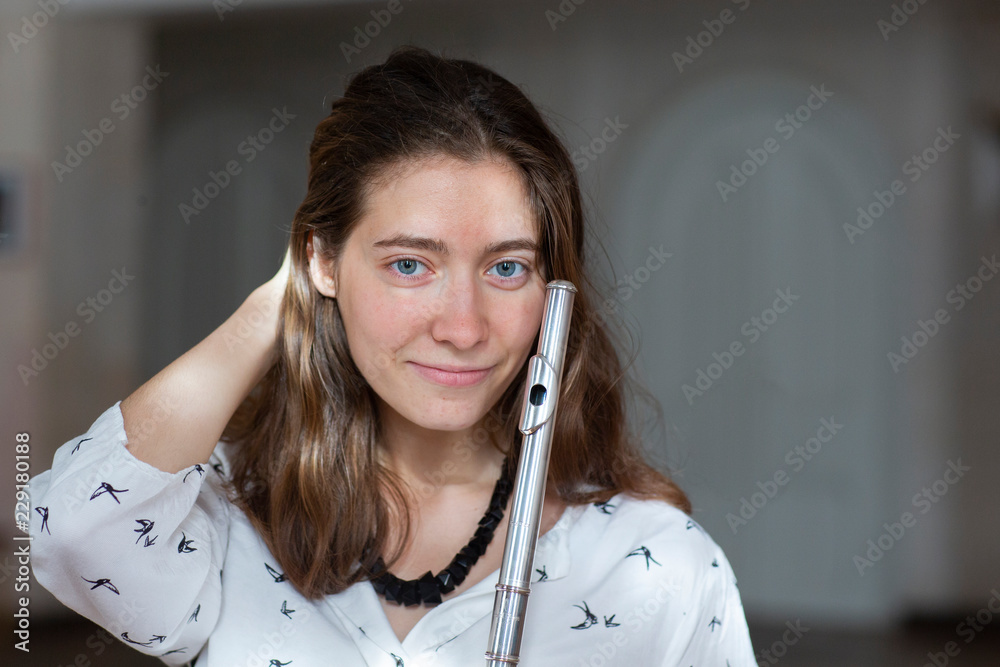 Beautiful young woman with flute Genre portrait of young beautiful girl Beautiful young woman with flute Genre portrait of young beautiful girl