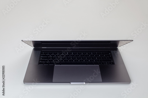 New high-speed thin grey aluminum laptop computer notebook front view photo