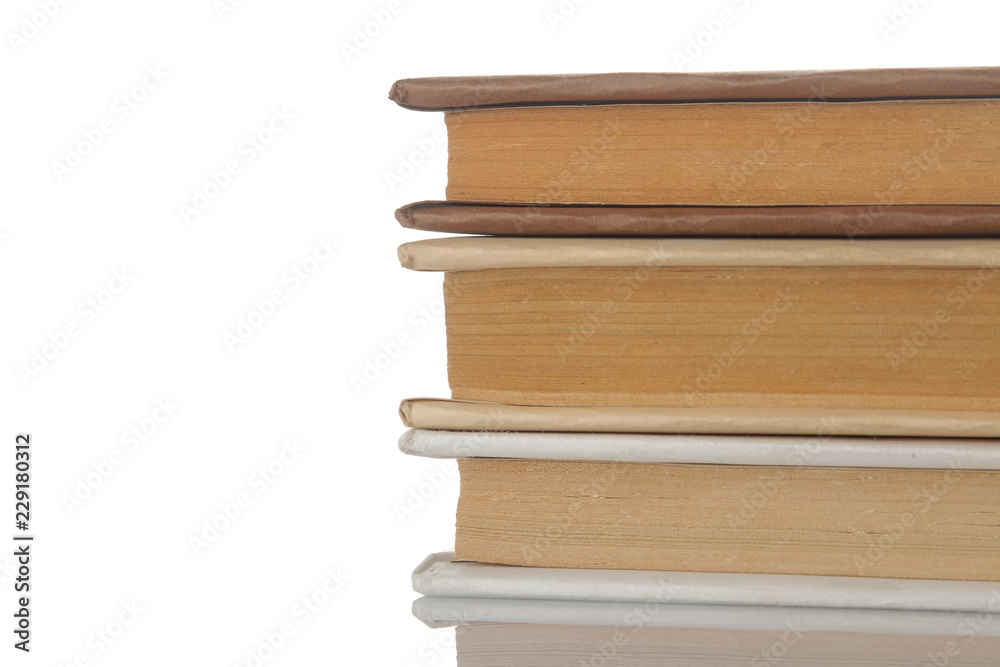 Stack of books on a white isolated background. Old books. Education. school. study Stack of books on a white isolated background. Old books. Education. school. study