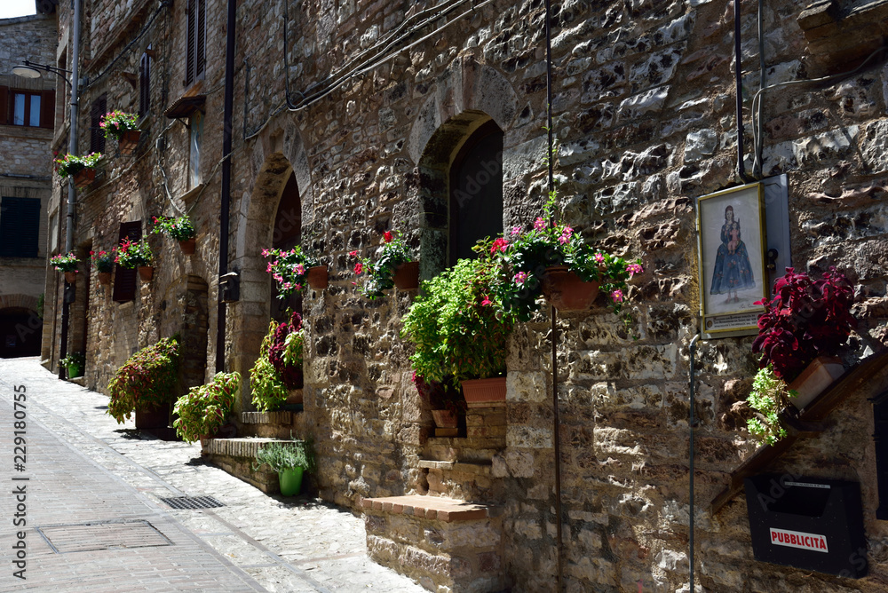 Floral streets of Spello in Umbria, Italy.