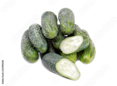 Fresh green cucumbers on white isolated background. Fresh vegetables.