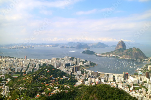 Panoramic View of Rio de Janeiro in a Cloudy Day with Sugarloaf Mountain seen from Corcovado Hill, Brazil 