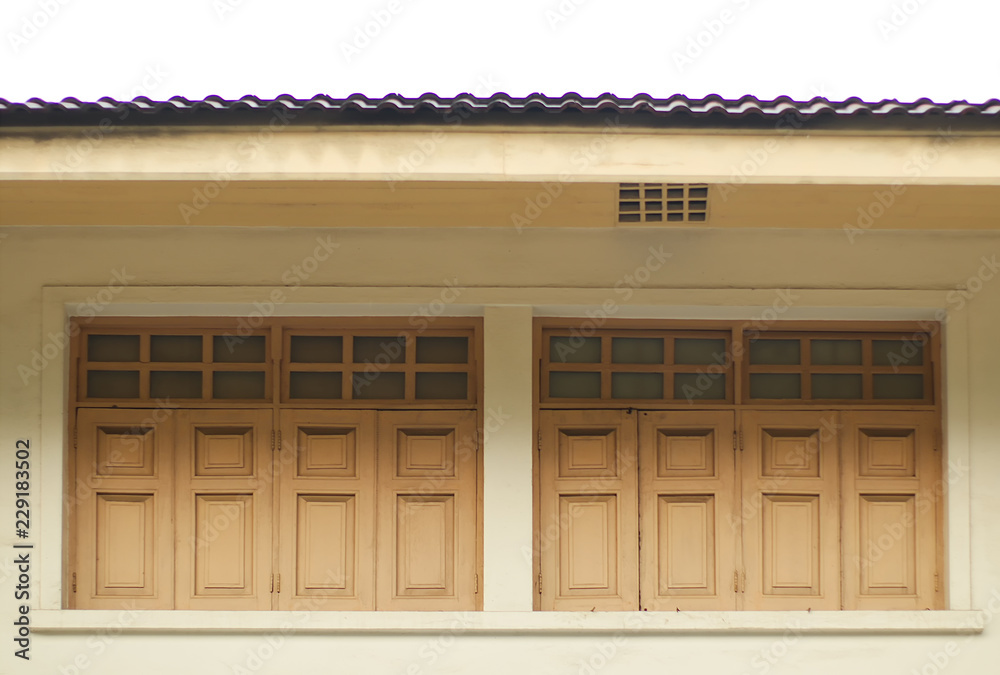 Old wood window in the yellow brown building. Old wood window in the yellow brown building.