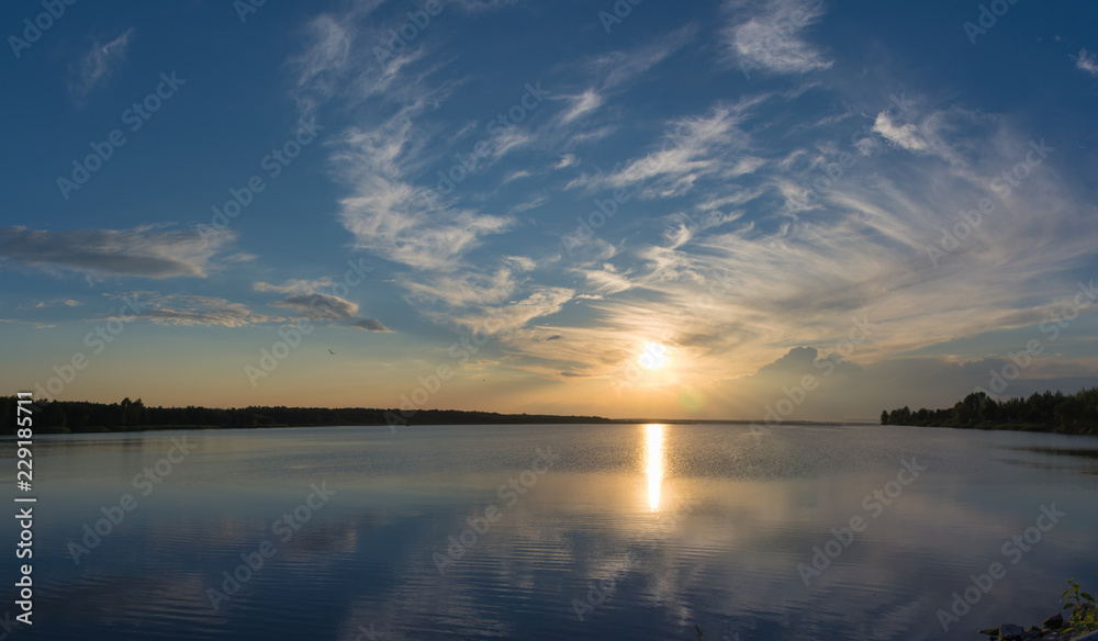 Panoramic view and sunset image on the calm river