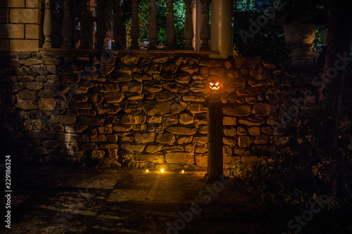 Halloween pumpkin. Carved Halloween pumpkin glowing in the dark.