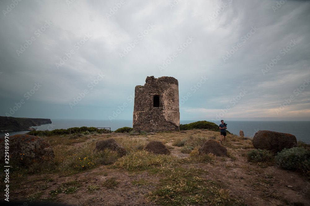 beautiful panorama in Sardinia with an old tower