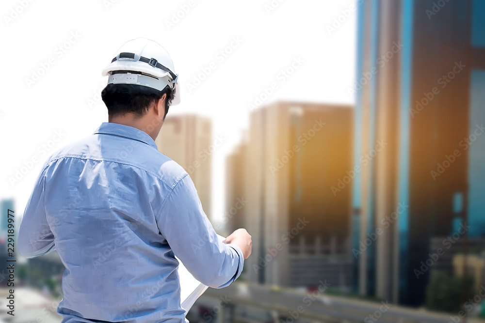 Engineers are working on plans to build high-rise buildings.Conecept engineer building.. Engineers are working on plans to build high-rise buildings.Conecept engineer building..