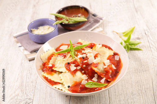 raviolis with tomato sauce and basil