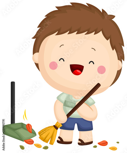 a boy sweeping leafs with many colors