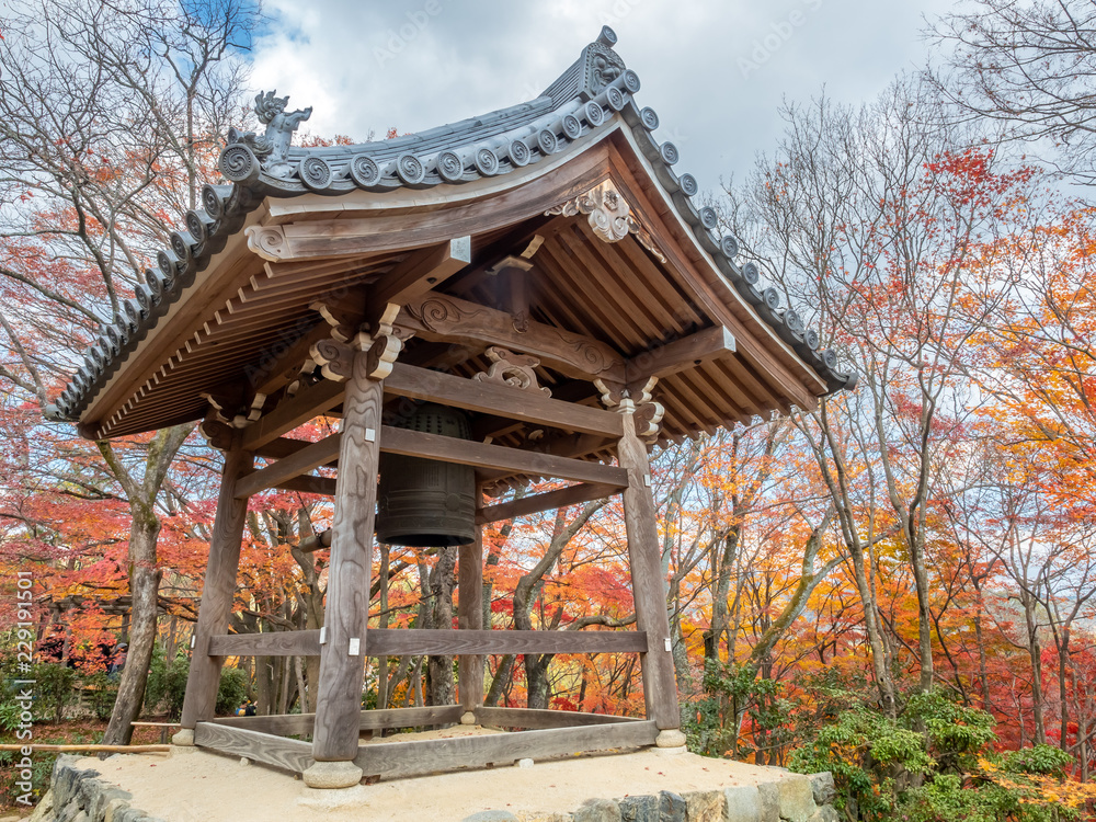 Wooden bell pavilion in autumn