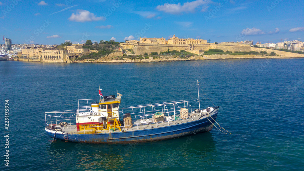 Boat in front of Manoel Island, Malta